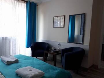 Фото номера Семейный номер с балконом Проживание в семье Pensjonacik Jeziorak- guest house г. Илава 3