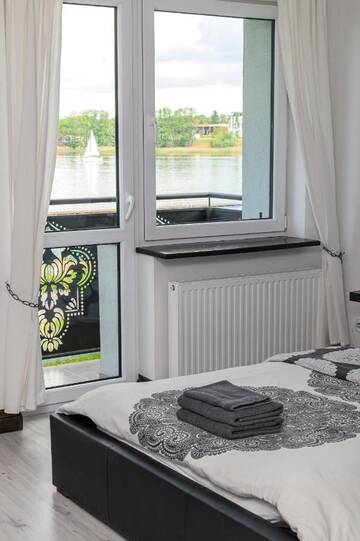 Фото номера Двухместный номер с 1 кроватью, вид на озеро Проживание в семье Villa Orient г. Илава 6