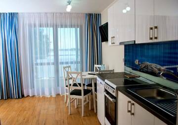 Фото номера Апартаменты с видом на озеро Апарт-отели Apartamenty Kapitanskie г. Илава 5