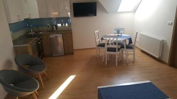 Фото номера Апартаменты с 2 спальнями Апарт-отели Apartamenty Kapitanskie г. Илава 7